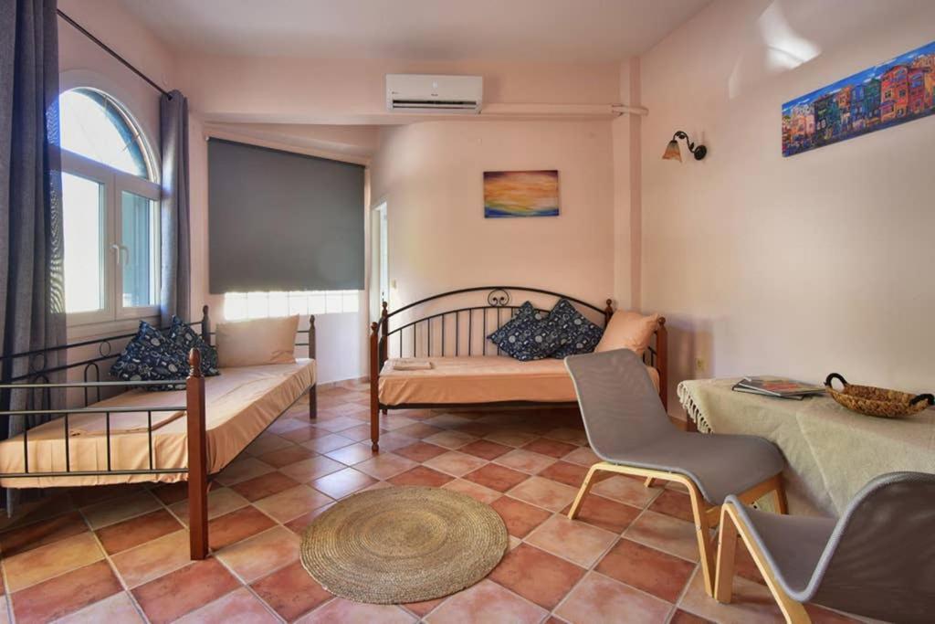 Nafsikas Apartment - Ipsos Beach ภายนอก รูปภาพ
